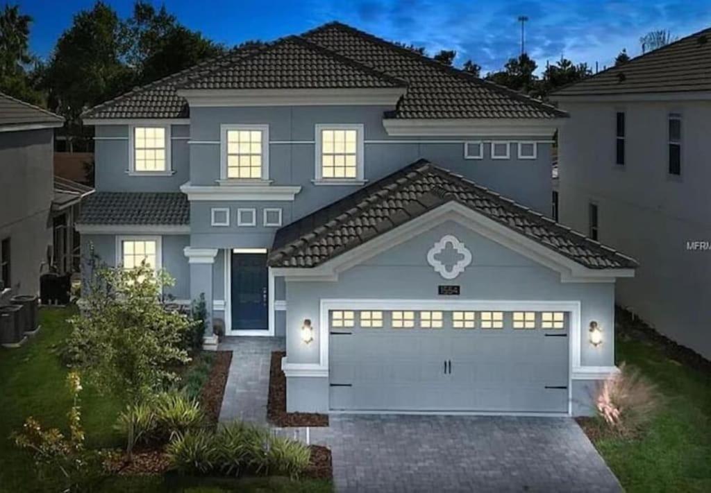 At Champions Gate In Orlando Near Theme Parks With Private Pool, & Movie Theater Davenport
