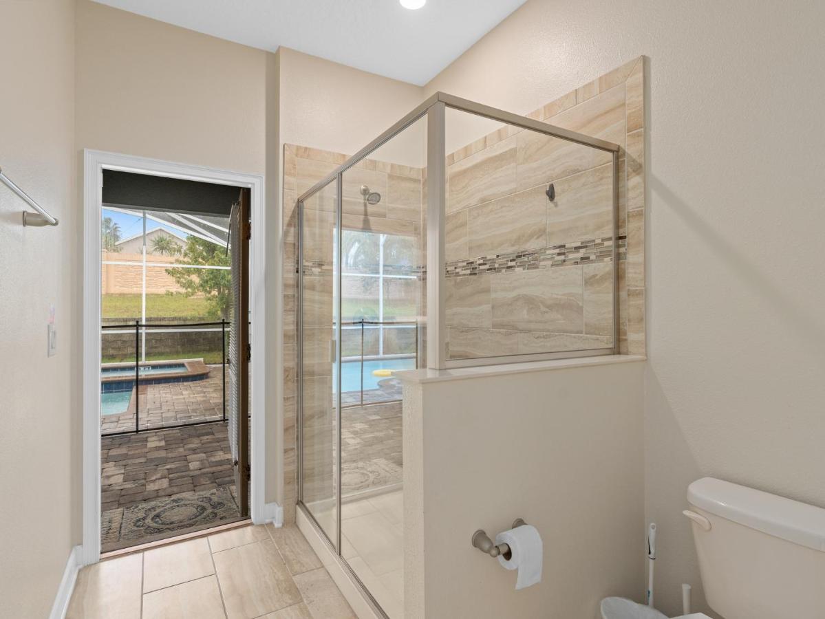 At Champions Gate In Orlando Near Theme Parks With Private Pool, & Movie Theater Villa Davenport