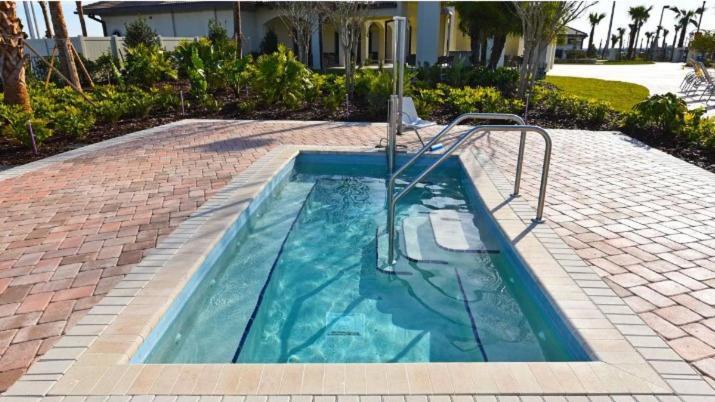 At Champions Gate In Orlando Near Theme Parks With Private Pool, & Movie Theater *